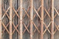 Old style grunge metal door. rustic expanded metal shutter door close Royalty Free Stock Photo