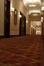 old style hotel hallways with eerie lighting