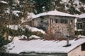 Old style house, snow on roof, ancient style house
