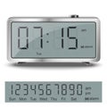 Old style liquid-crystal alarm clock with black numbers and glare metallic body isolated