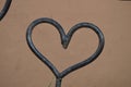 Old style metal heart shape decoration from a gate