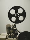 Old style movie projector, still-life, close-up. vintage, old-fashioned film projector, blurred background Royalty Free Stock Photo