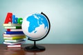 Old Style Photo. Books with ABC sign and World desktop globe Royalty Free Stock Photo