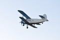 Old plane flying and spraying the crops Royalty Free Stock Photo