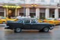 HAVANA, CUBA - OCTOBER 21, 2017: Old Style Retro Car in Havana, Cuba. Public Transport Taxi Car for Tourist and Local People. Blac Royalty Free Stock Photo