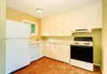 Old style simple kitchen interior with white cabinets Royalty Free Stock Photo