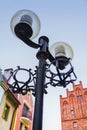 Old style street light, Beautiful streetlight in front of old building Olsztyn, Poland Royalty Free Stock Photo