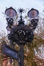 Old style street light, Beautiful streetlight in front of old building Olsztyn, Poland Royalty Free Stock Photo