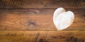 Retro classic Valentine`s Day cad, large white painted wooden hart isolated and on right side with large copy space on vintage oak