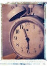 Old style vintage antique alarm clock with numbers and bells Royalty Free Stock Photo