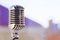 Old style vocal microphone. Retro classic design. Tinted photo Royalty Free Stock Photo