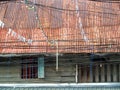 Old style wood ancient house and rust erosion roof Royalty Free Stock Photo
