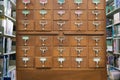 An old style wooden cabinet of library card or file catalog ind