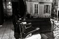 Old-styled barber shop view through the window with street reflecting