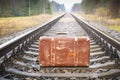 Old suitcase on the railway Royalty Free Stock Photo