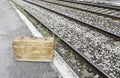 Old suitcase in a train station Royalty Free Stock Photo