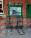 Vintage preserved railway station & old suitcase trolley`s.