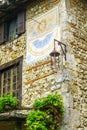 Old sun clock, in the medieval village Perouges Royalty Free Stock Photo