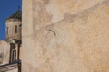 Old sundial on vertical stone wall of Gelati, Georgia Royalty Free Stock Photo