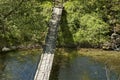 Old suspension bridge over river Vit in the springtime near Teteven town Royalty Free Stock Photo