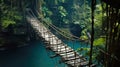 Old suspension wood bridge in tropical forest, vintage dangerous footbridge across river in summer. Scenery of green jungle and