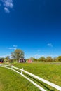 Old Swedish red wooden farm buildings with white fence Royalty Free Stock Photo