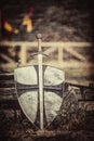 The old sword and shield on the castle background Royalty Free Stock Photo