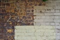 Old Hand Made Brick House Wall, Half Bare, Half Painted White