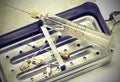 old syringe in glass and many neddles Royalty Free Stock Photo