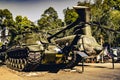 Old tank and Chinook helicopter on display in the War remnants museum in Saigon. Both fought in the Vietnam war. (Ho Chi Minh City