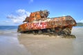 Old tank at Flamenco Beach Royalty Free Stock Photo