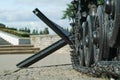 Old tank. Wheels and track closeup and peaceful background. Monument to old weapons close-up. Symbol of the end of the war