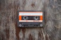 Old tape cassette, old or aged wood background. ÃÂ°solated casette