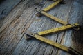 Old Tape Measure on Rustic Wood Royalty Free Stock Photo