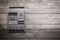 the old tape recorder and cassette on wooden background Royalty Free Stock Photo