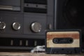 the old tape recorder and cassette on wooden table Royalty Free Stock Photo