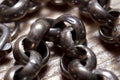 an old, tarnished silver metal chain with round links Royalty Free Stock Photo