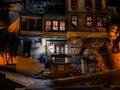Old tavern at night in small Greek city