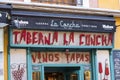 Old tavern signs on the streets of the old city of Madrid in Spain.