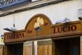 Old tavern signs on the streets of the old city of Madrid in Spain.