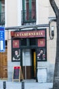 Old tavern signs on the streets of the old city of Madrid in Spain.