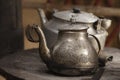 Old teapot and kettle in a kyrgyz yurt kitchen Royalty Free Stock Photo