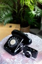 Old telephone black color on wood table. classic retro vintage s Royalty Free Stock Photo