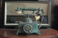 Old telephone retro rotary phone antique style in vintage room Royalty Free Stock Photo