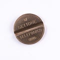 Old telephone token Royalty Free Stock Photo