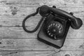 Old telephone on wooden background Royalty Free Stock Photo