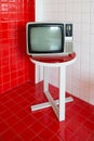 Old television on wooden chair Royalty Free Stock Photo