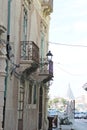 Old tenement houses and a view of the church in Syracuse in the distance Royalty Free Stock Photo