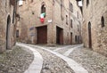 Old terraced houses on cobbled alleyway