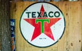 Old Texaco Sign on Wood Wall